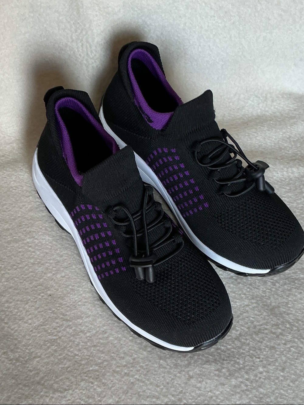 Women's Black Knit Slip-On Athletic Sneakers with Purple Accents